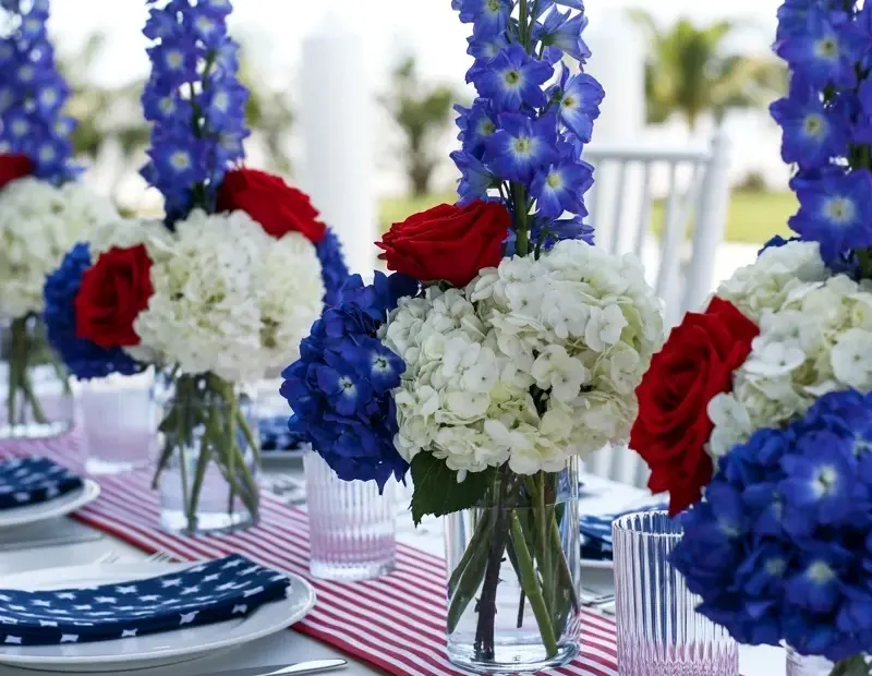 Patriotic Fourth of July Tablescape with Blue Delphinium and Red Roses