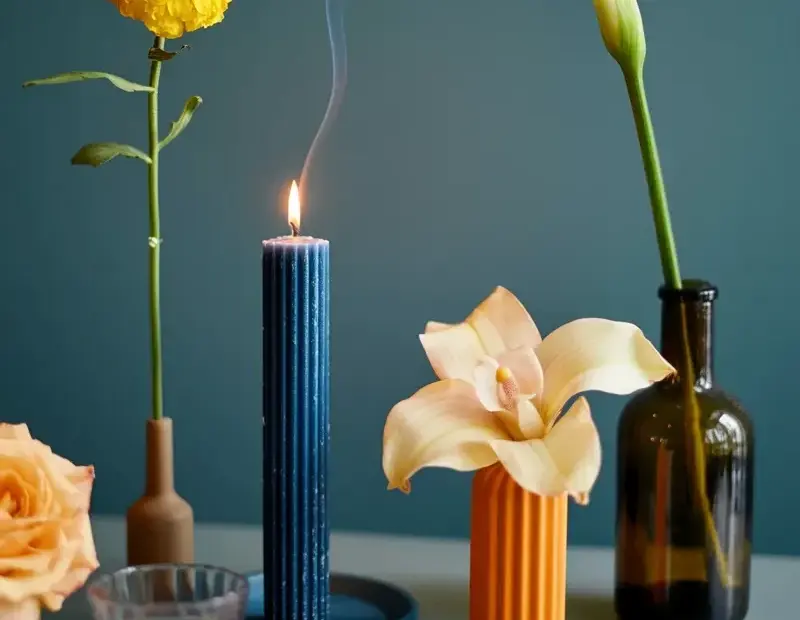 Moody still life transformation: before and after with candle and fresh flowers